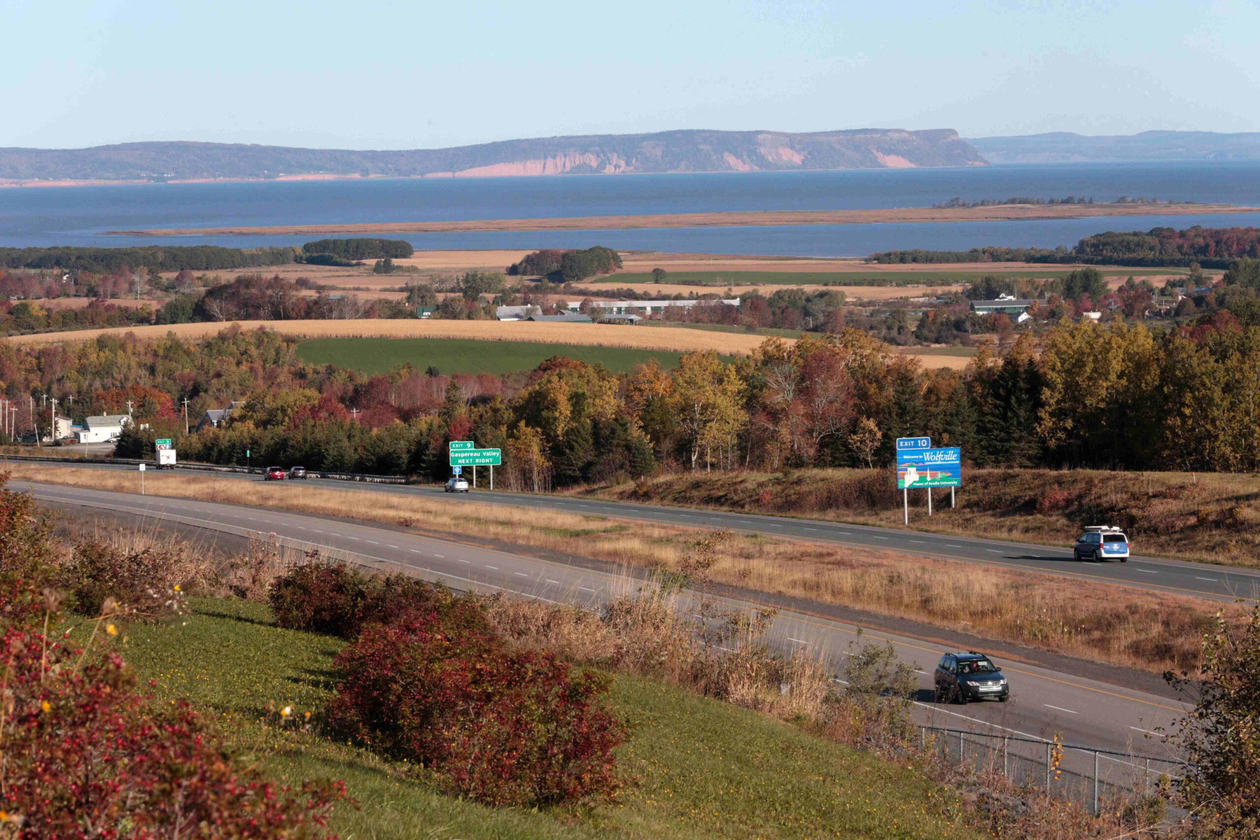 Aerial of the MacKay Bridge, Bedford Basin, the former Africville lands and Africville Park, with the narrows and Tuft's Cove seen further in the background.