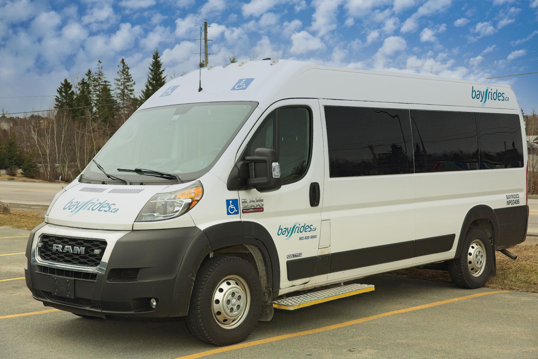 A wheelchair accessible van with a Bayrides logo on the side.