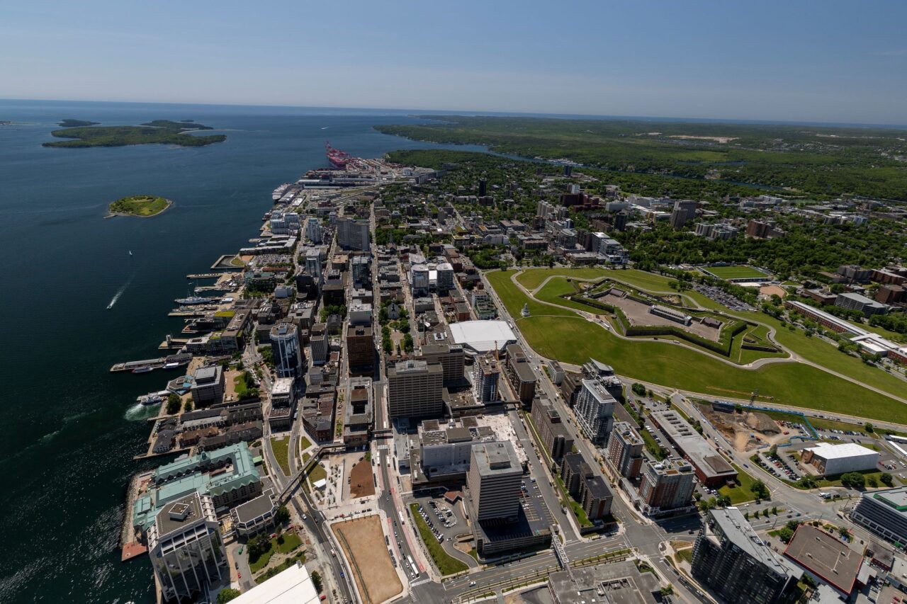 An aerial view of downtown Halifax in summer, facing south toward the mouth of Halifax Harbour